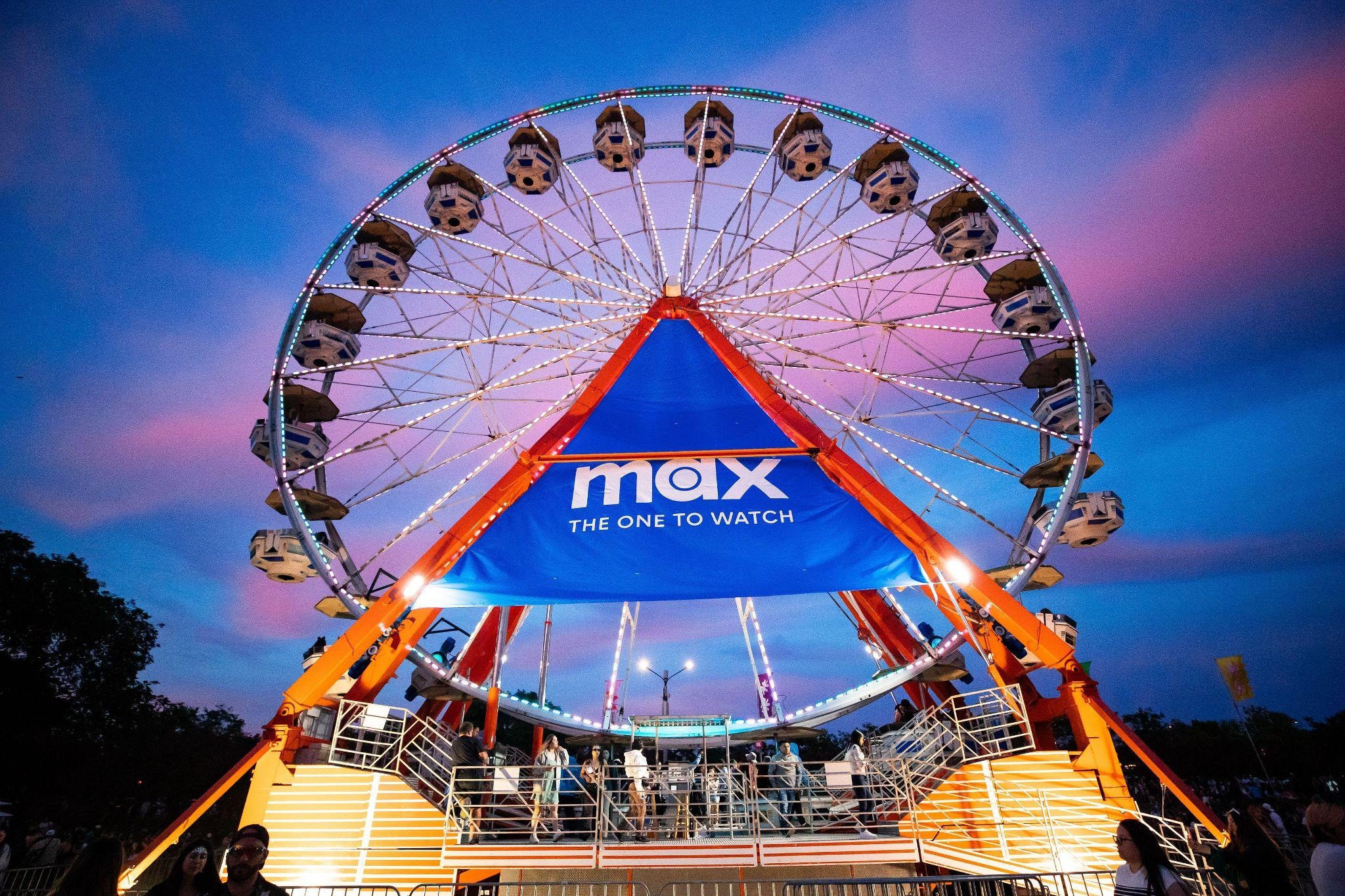 Max 'The One to Watch' ferris wheel — the festival activation at dusk