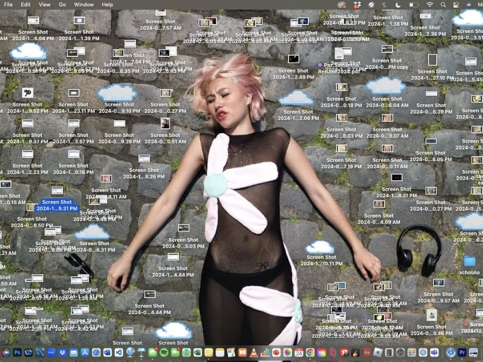 Annabelle in the mesh flower dress, composited over a desktop buried in screenshots
